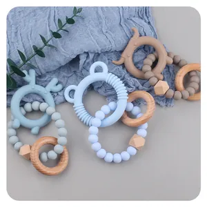 Beißring-Set aus Silikonbär und Buchenholz für Babys in sanften Makronenfarben