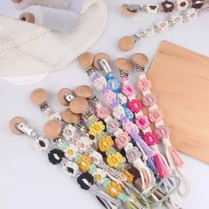 Handgefertigte Schnullerketten aus Baumwolle mit Sonnenblumenmuster und Buchenholz-Clips