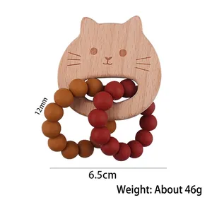 Cat-shaped beech wood baby teether ring with silicone beads in yellow and red colors