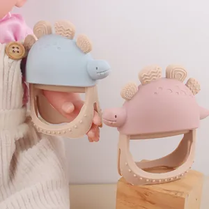 Anneau de dentition dinosaure en silicone bleu et rose pour soulager les gencives de bébé