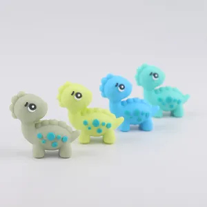 Cartoon-Dinosaurier Silikon-Beißperlen in vier Farben für DIY Schnullerketten und Basteln