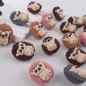 Close-up of cute cartoon hedgehog silicone beads for DIY jewelry and teether clips