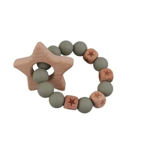 Natural beech wood star teether ring with olive green silicone beads for infants