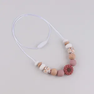 Silicone daisy teething necklace with wood beads and red sunflower pendant for infants