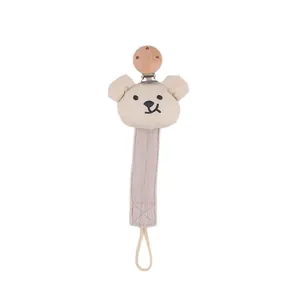 Neutral cotton pacifier clip with plush bear head and wooden clasp for newborns
