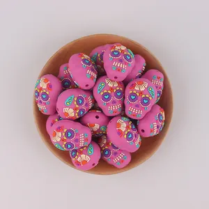 Macro di perline in silicone a forma di teschio rosa per la creazione di gioielli