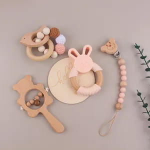 Set de 5 jouets pour bébé en hêtre et silicone avec anneau de dentition lapin rose