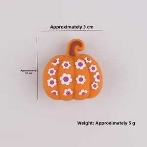 Dettaglio perla 3D a zucca in silicone arancione con fiore per decorazioni fai-da-te