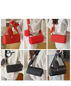Detailed views of red and black cylinder crossbody bags with detachable coin purses