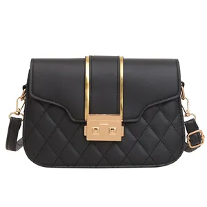 Chic black quilted crossbody bag with gold square lock and adjustable shoulder strap