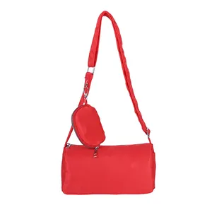Red nylon toast-shaped crossbody bag with matching round coin purse on adjustable strap