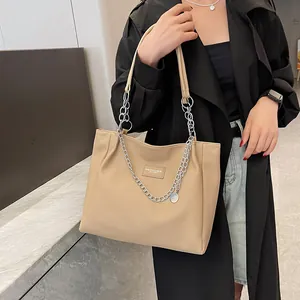 Large apricot tote bag with lychee texture leather and silver chain strap for women