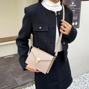 Minimalistische beige PU-Leder Umhängetasche mit goldenem Metall-Drehverschluss für Damen