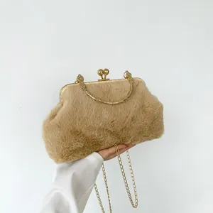 Detailed macro view of khaki faux fur texture with golden vintage kiss-lock metal frame