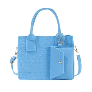 Sky blue embossed felt tote bag with small coin purse and adjustable strap in square shape