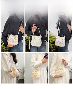 Model display of mini canvas bucket bags with floral embroidery and lace details
