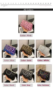 Detail showing various colors of embroidered sequin clutch bags with metal ring handles