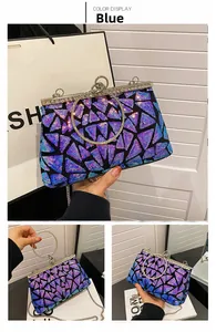 Detailed close-up of blue and purple sequin embroidery on a vintage dinner clutch bag