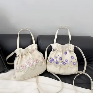 Embroidered floral lace canvas bucket bag with drawstring closure for women