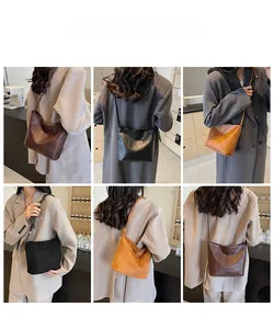Detail of adjustable knotted straps on suede bucket bags in brown, black, and tan colors