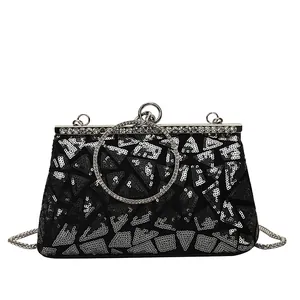 Sparkly sequins evening clutch bag with round metal handle and rhinestone trim