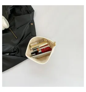 Gesteppte Canvas-Clutch mit großem Fassungsvermögen für Lippenstifte und Handy