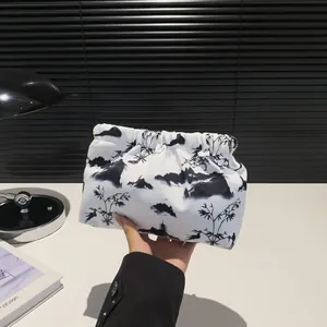 Portable cosmetic bag with Chinese ink landscape painting and pleated drawstring closure