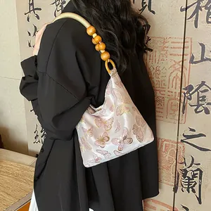 Elegante Tasche im chinesischen Stil mit Schmetterlingsmuster und Holzperlengriff
