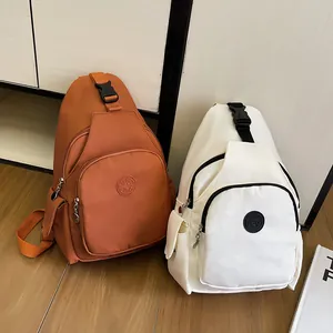 Minimalist casual chest bags in orange and white colors with durable sport fabric texture