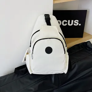 Modern white nylon chest bag with black adjustable strap and sporty logo on black base