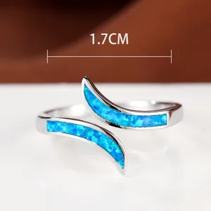 Minimalist silver open ring with blue opal stones and 1.7cm diameter dimension guide
