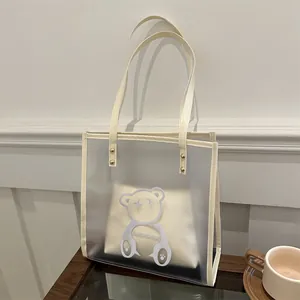 Translucent cream white PVC jelly tote bag with a cute bear print and inner pouch