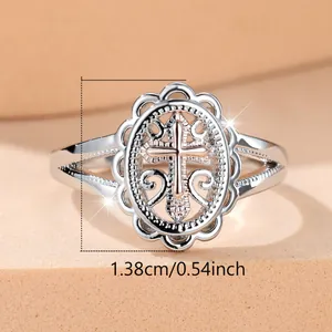 Vintage silver ring featuring a rose gold cross and ornate hollow lace design, 1.38cm wide