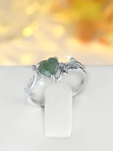 Detailed view of S925 silver ring featuring heart green moss agate with leaf design