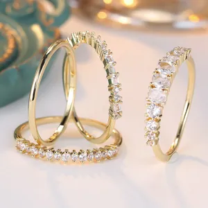 Three-piece gold-plated ring set with round cubic zirconia in minimalist stacked design
