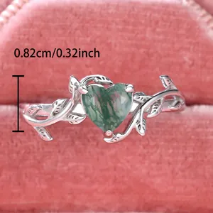 S925 sterling silver leaf ring with heart-shaped moss agate in a pink jewelry box