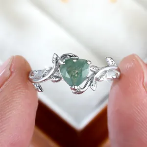 Nature-style heart moss agate ring with vine and leaf sterling silver band