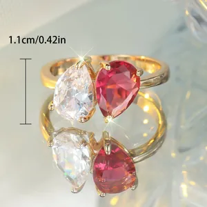 Bague dorée avec deux zircons en forme de poire rouge et blanc, hauteur 1.1cm chic style