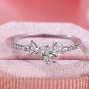 Exquisite S925 sterling silver bow ring with sparkling pavé cubic zirconia diamonds