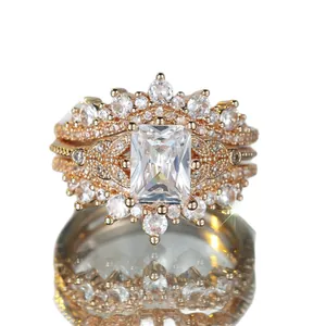 Conjunto de anillos en V oro champán con circón blanco y acabado oro rosa