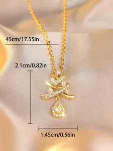 Detailed close-up of Christmas tree necklace with sparkling stones and size dimensions