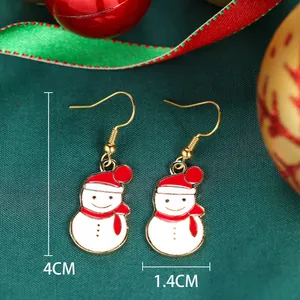 Detailed view of enamel snowman earrings with Christmas hat and scarf, 4cm height size