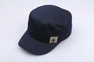 Detailed view of navy blue cotton cadet cap with embroidered star patch on the side