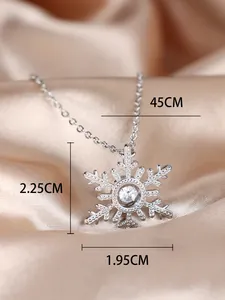Detailed view of silver snowflake pendant with dimensions 2.25cm height and 45cm chain