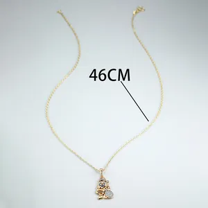 Detail of 46cm gold necklace with Santa Claus pendant featuring sparkling crystals