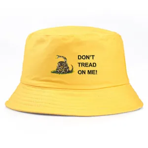 Yellow Gadsden Flag bucket hat with Don't Tread On Me rattlesnake print design