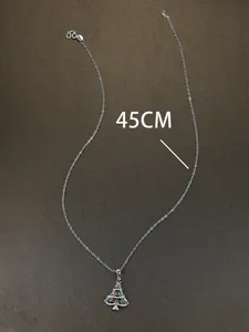 Detailed view of silver Christmas tree necklace with colorful rhinestones and 45cm chain