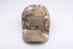 Detailed view of multicam tactical baseball cap with front hook and loop fastener patch area
