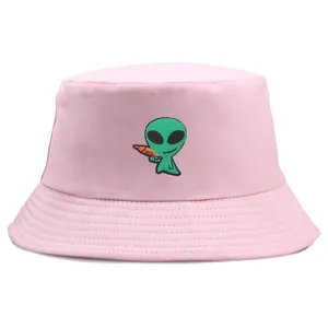 Pink bucket hat featuring green alien embroidery on high-quality cotton fabric