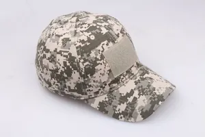 Close-up of tactical camo baseball cap showing digital camouflage and velcro patch